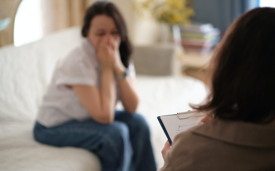 woman finds solace in the confidence and support of her therapist during a counseling session. The